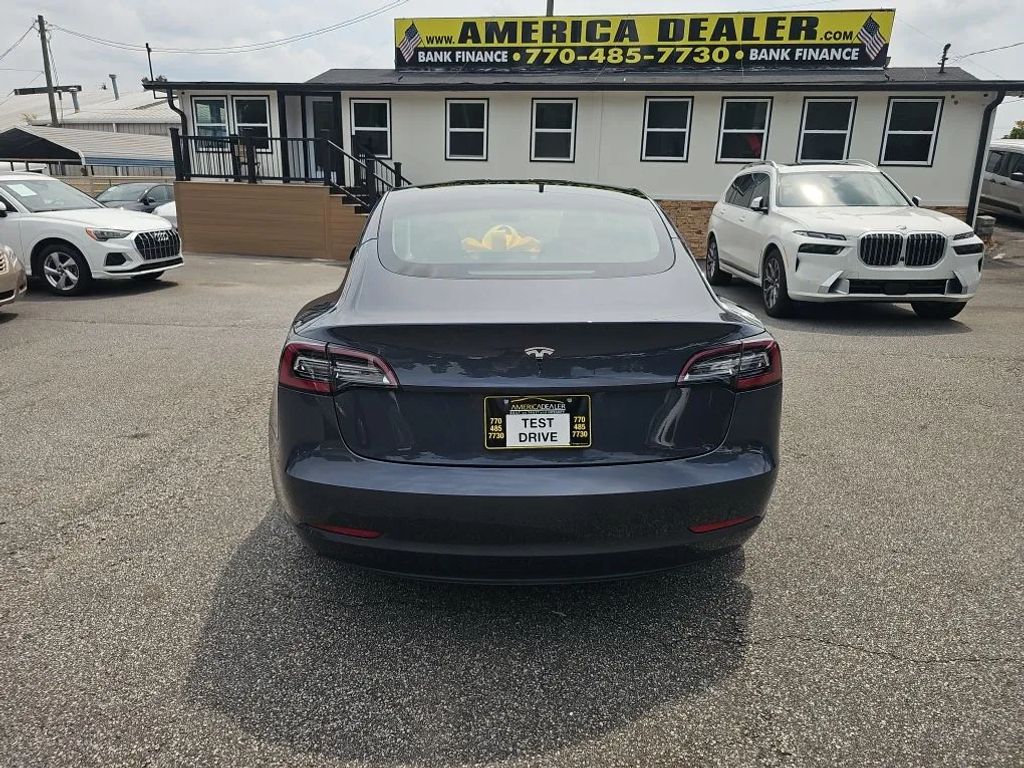 tesla model 3 2023 5YJ3E1EA7PF408934 image tesla model 3 2023 5YJ3E1EA7PF408934 image